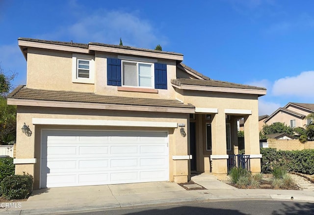 1123 Paseo Las Nubes, Oxnard, CA 93030 - traditional-style home with stucco siding, an attached garage, and driveway