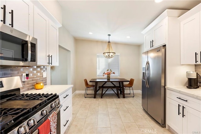 1292 N California Ave, Beaumont, CA 92223 - kitchen featuring stainless steel appliances, recessed lighting, backsplash, and white cabinets