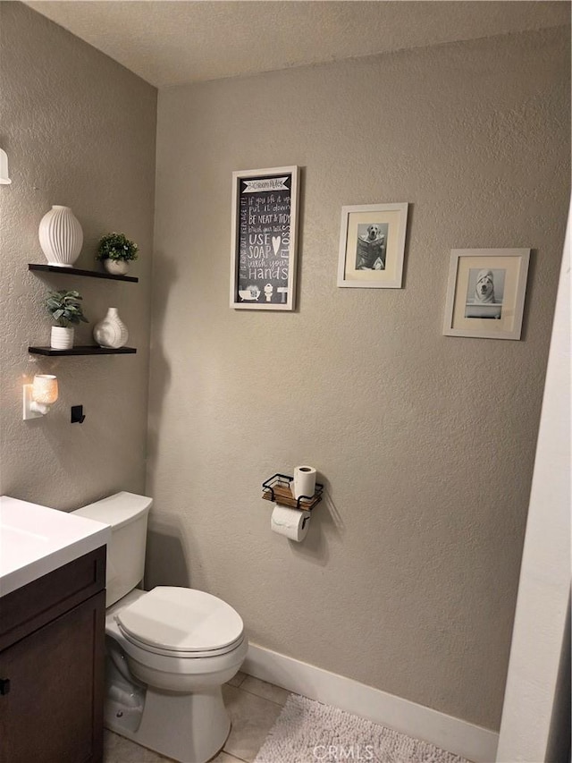 1292 N California Ave, Beaumont, CA 92223 - bathroom with tile patterned floors, vanity, and a textured wall