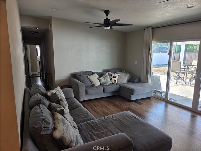 1292 N California Ave, Beaumont, CA 92223 - living room featuring wood finished floors, ceiling fan, and a textured ceiling