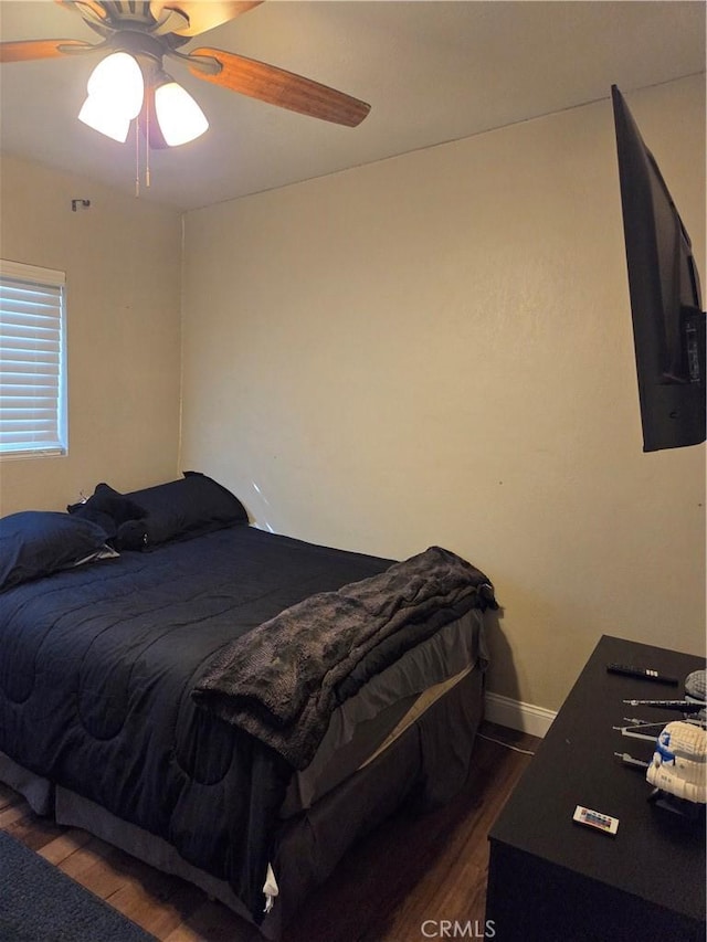 1292 N California Ave, Beaumont, CA 92223 - bedroom with dark wood-style floors and ceiling fan