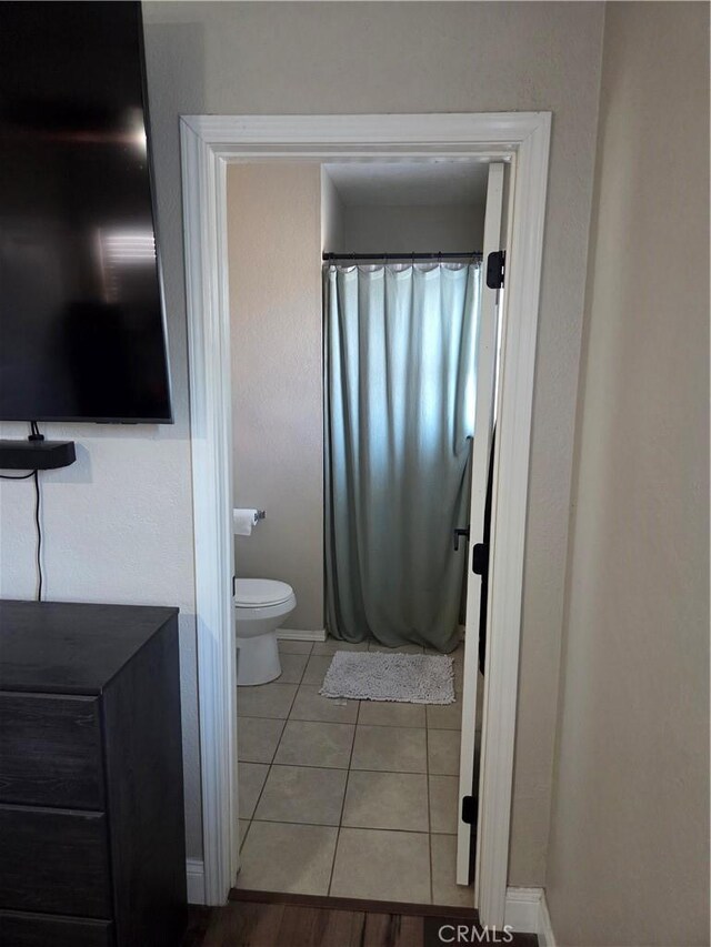 1292 N California Ave, Beaumont, CA 92223 - full bath with tile patterned floors and curtained shower