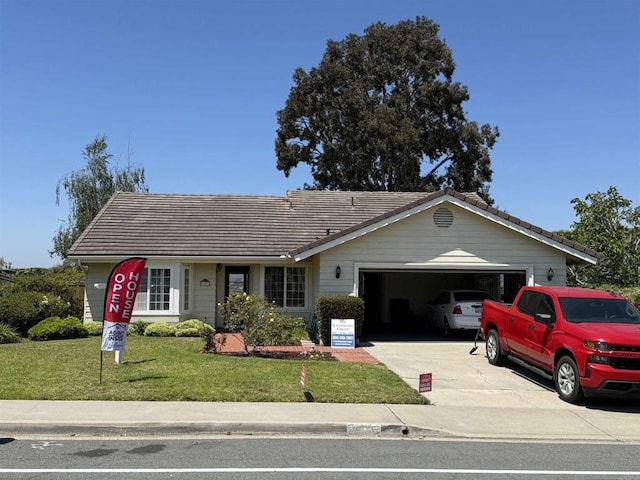 1633 Willowspring Dr N, Encinitas, CA 92024 - single story home featuring a tile roof, a garage, concrete driveway, and a front yard