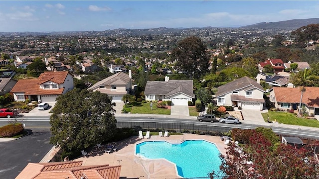 1633 Willowspring Dr N, Encinitas, CA 92024 - aerial view of residential area featuring a pool area and a mountain backdrop