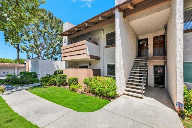 17574 Vandenberg Ln Unit 1, Tustin, CA 92780 - view of building exterior with stairway