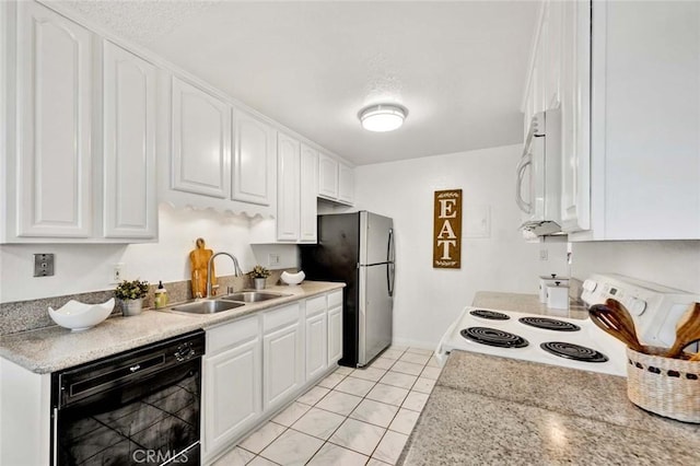 17574 Vandenberg Ln Unit 1, Tustin, CA 92780 - kitchen featuring white appliances, white cabinets, light tile patterned flooring, and light countertops