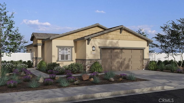 8158 Perada St, Jurupa Valley, CA 92509 - view of front of house featuring stone siding, a garage, concrete driveway, and stucco siding