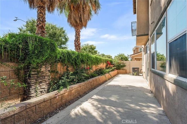 28419 Sunflower St, Highland, CA 92346 - fenced backyard with a patio