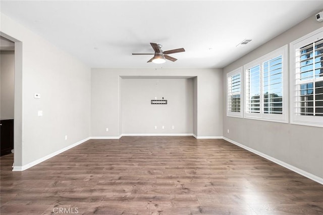 28419 Sunflower St, Highland, CA 92346 - unfurnished room with a ceiling fan and wood finished floors