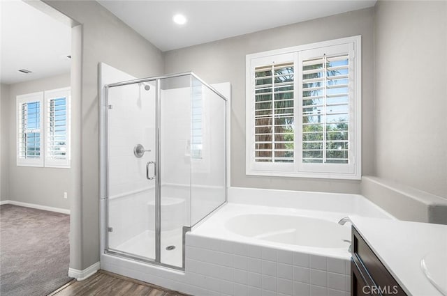28419 Sunflower St, Highland, CA 92346 - bathroom featuring a bath, a stall shower, vanity, and recessed lighting