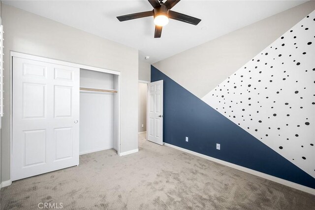28419 Sunflower St, Highland, CA 92346 - unfurnished bedroom with carpet floors, a closet, and ceiling fan