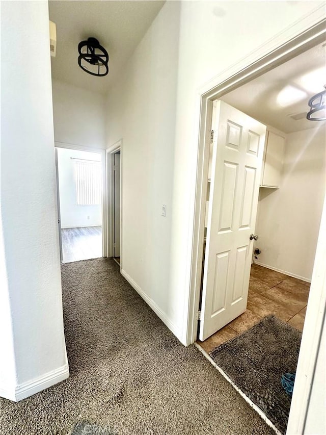3415 Genoa Pl, Palmdale, CA 93551 - hallway featuring baseboards and carpet