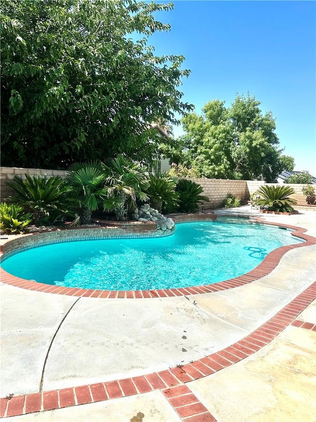 3415 Genoa Pl, Palmdale, CA 93551 - view of pool with a fenced backyard and a patio area
