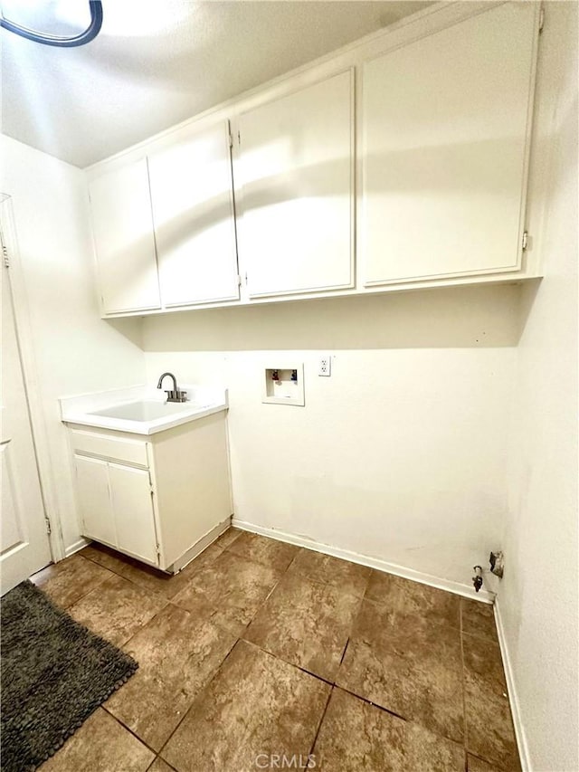 3415 Genoa Pl, Palmdale, CA 93551 - washroom with washer hookup and cabinet space