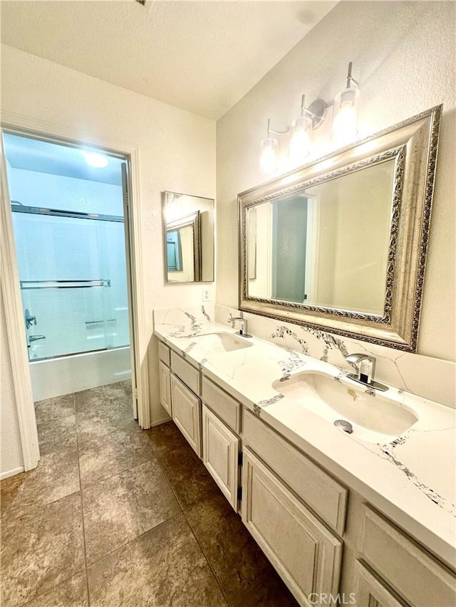 3415 Genoa Pl, Palmdale, CA 93551 - full bath with double vanity and shower / bath combination with glass door