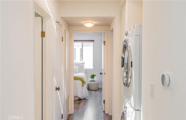 334 California St Unit D, Arcadia, CA 91006 - laundry room with wood finished floors and stacked washer and clothes dryer