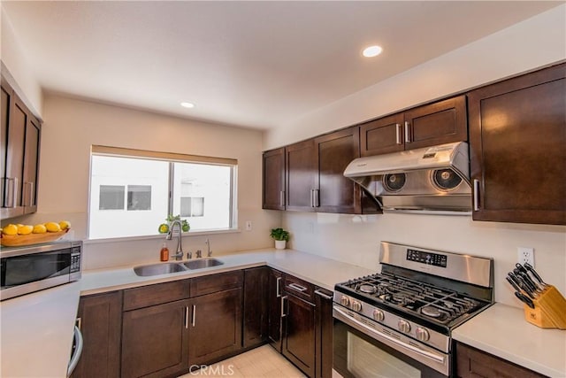 334 California St Unit D, Arcadia, CA 91006 - kitchen featuring appliances with stainless steel finishes, exhaust hood, light countertops, dark brown cabinetry, and recessed lighting