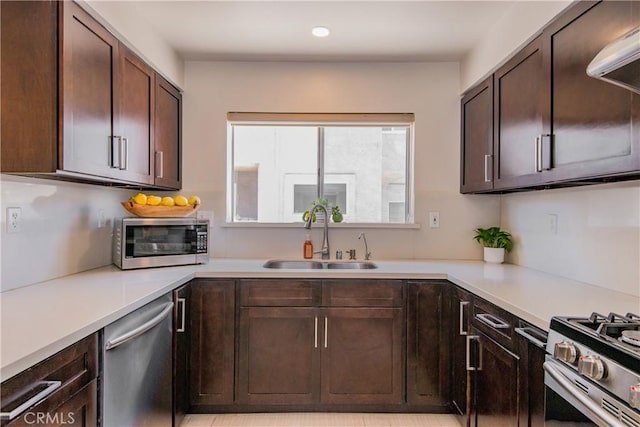 334 California St Unit D, Arcadia, CA 91006 - kitchen with stainless steel appliances, light countertops, ventilation hood, dark brown cabinetry, and recessed lighting