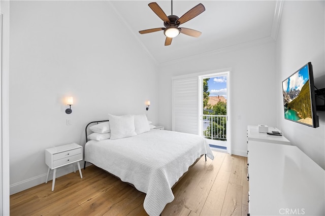 29426 Via Napoli Unit 121, Laguna Niguel, CA 92677 - bedroom with vaulted ceiling, ornamental molding, access to outside, light wood-type flooring, and ceiling fan