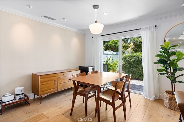 29426 Via Napoli Unit 121, Laguna Niguel, CA 92677 - dining room featuring ornamental molding, light wood-type flooring, and recessed lighting