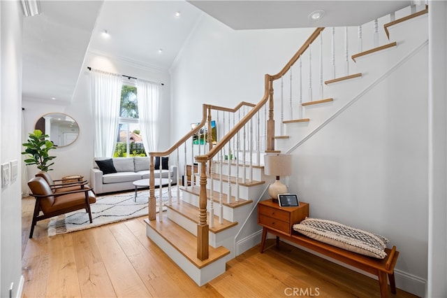 29426 Via Napoli Unit 121, Laguna Niguel, CA 92677 - stairway featuring hardwood / wood-style floors and crown molding