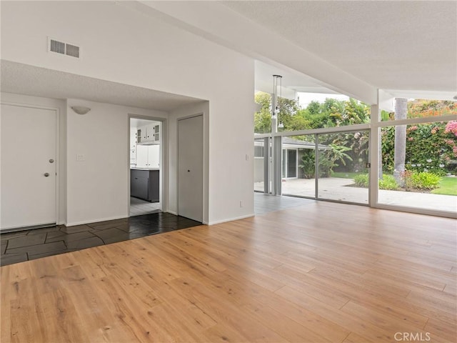 2640 Via Anacapa, Palos Verdes Estates, CA 90274 - empty room with wood finished floors and floor to ceiling windows