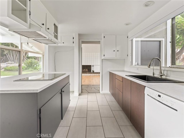 2640 Via Anacapa, Palos Verdes Estates, CA 90274 - kitchen featuring dishwasher, black electric cooktop, light countertops, white cabinetry, and light tile patterned floors