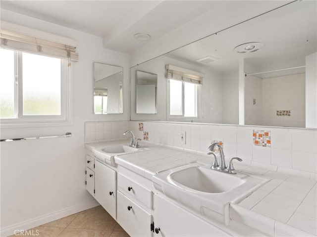 2640 Via Anacapa, Palos Verdes Estates, CA 90274 - bathroom with double vanity, tile patterned floors, decorative backsplash, and a shower