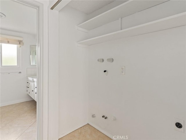 2640 Via Anacapa, Palos Verdes Estates, CA 90274 - laundry room featuring hookup for a gas dryer, light tile patterned floors, and electric dryer hookup