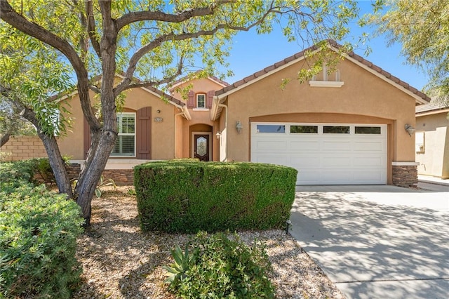 26135 Palm Breeze Ln, Menifee, CA 92586 - view of front of property with an attached garage, driveway, stucco siding, and a tiled roof