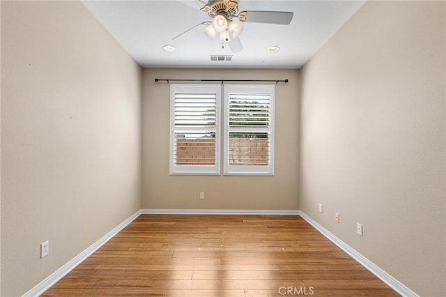 26135 Palm Breeze Ln, Menifee, CA 92586 - spare room featuring ceiling fan and light wood-style floors