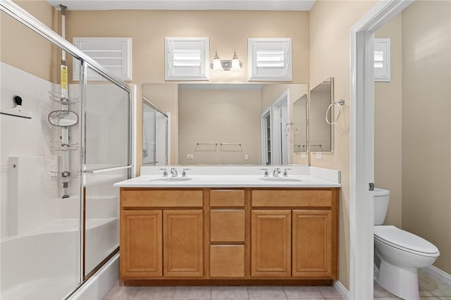 26135 Palm Breeze Ln, Menifee, CA 92586 - full bathroom featuring an enclosed shower, double vanity, and tile patterned floors