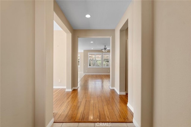 26135 Palm Breeze Ln, Menifee, CA 92586 - corridor featuring light wood-type flooring and recessed lighting
