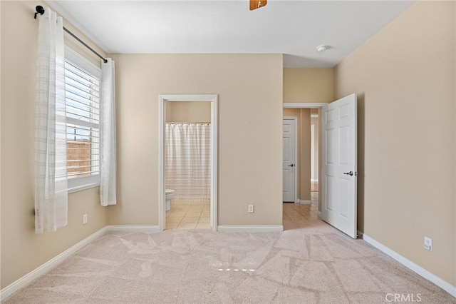 26135 Palm Breeze Ln, Menifee, CA 92586 - unfurnished bedroom with carpet floors and ensuite bath