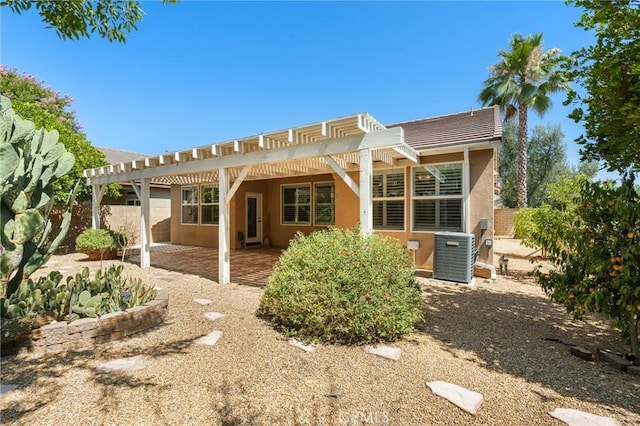26135 Palm Breeze Ln, Menifee, CA 92586 - rear view of property with a pergola, stucco siding, a patio, and a tile roof