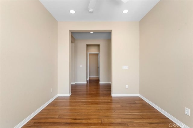 26135 Palm Breeze Ln, Menifee, CA 92586 - spare room with wood finished floors and recessed lighting