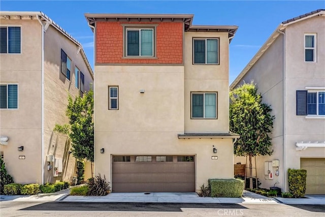 40 Riverton St, Phillips Ranch, CA 91766 - view of front facade featuring stucco siding and a garage