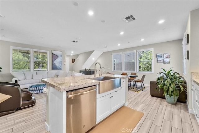 40 Riverton St, Phillips Ranch, CA 91766 - kitchen featuring dishwasher, open floor plan, white cabinetry, wood tiled floors, and recessed lighting