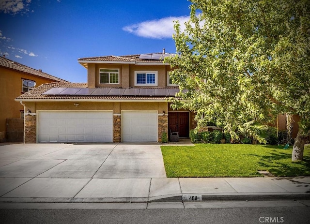 4011 Prestwick Ln, Palmdale, CA 93551 - view of front of home featuring solar panels, a front lawn, driveway, and stucco siding