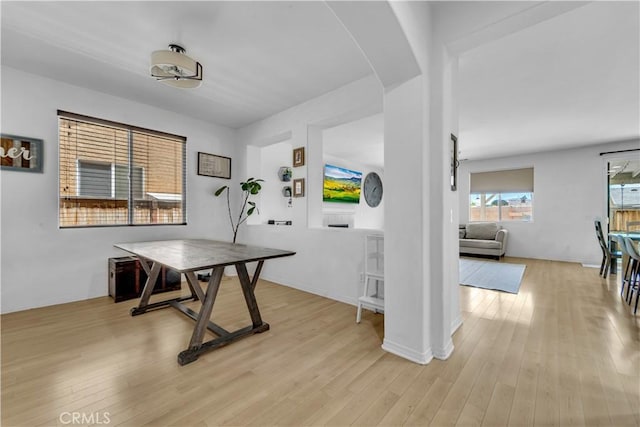 3026 Neary Ct, Rosamond, CA 93560 - dining room featuring arched walkways and light wood finished floors