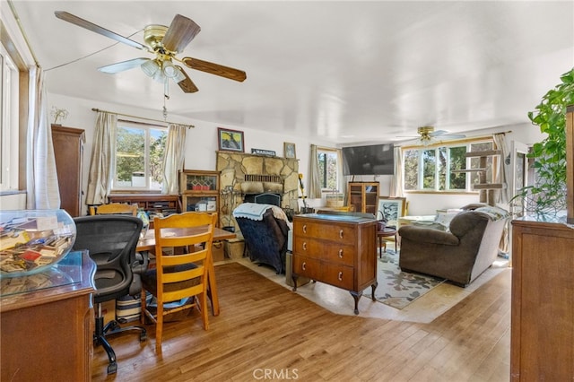 29239 Lake Brook Ave, Cedar Glen, CA 92321 - bedroom with multiple windows, an office area, and light wood-type flooring