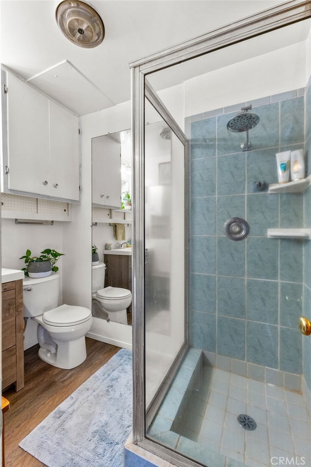 29239 Lake Brook Ave, Cedar Glen, CA 92321 - bathroom with wood finished floors, a stall shower, and vanity