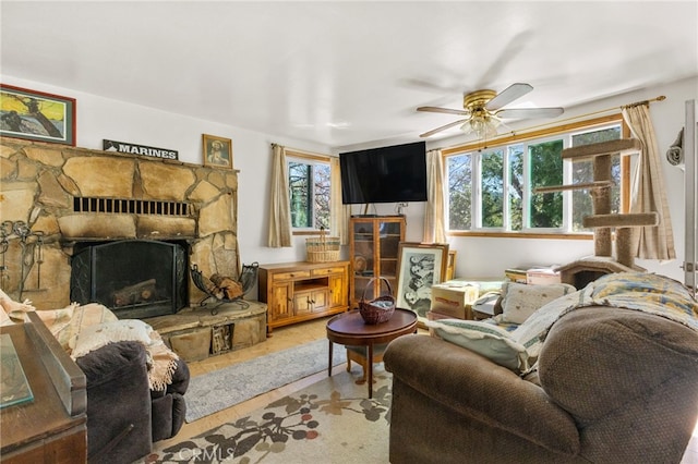 29239 Lake Brook Ave, Cedar Glen, CA 92321 - living room with a fireplace, plenty of natural light, ceiling fan, and light wood-style floors
