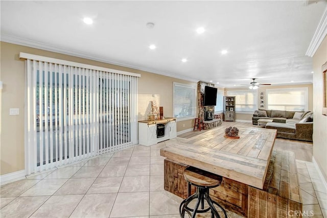 8555 Pigeon Pass Rd, Moreno Valley, CA 92557 - living room with ornamental molding, a ceiling fan, recessed lighting, and light tile patterned flooring