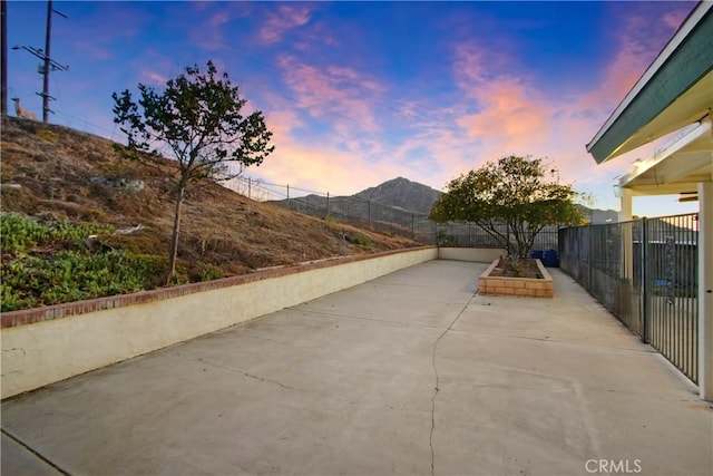 8555 Pigeon Pass Rd, Moreno Valley, CA 92557 - patio terrace at dusk featuring a patio