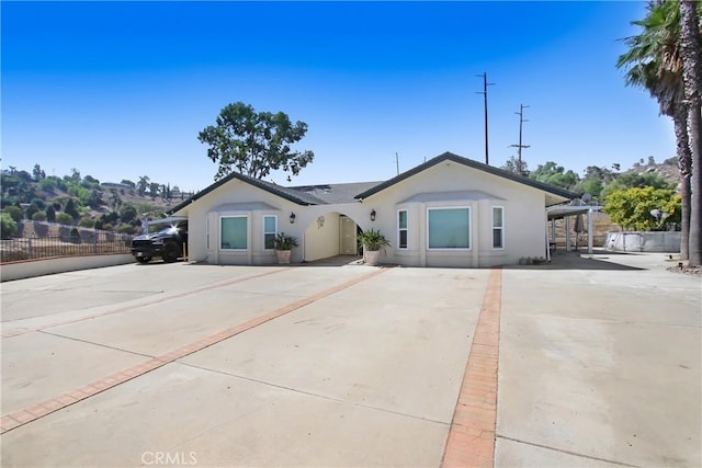 8555 Pigeon Pass Rd, Moreno Valley, CA 92557 - ranch-style house featuring stucco siding and driveway