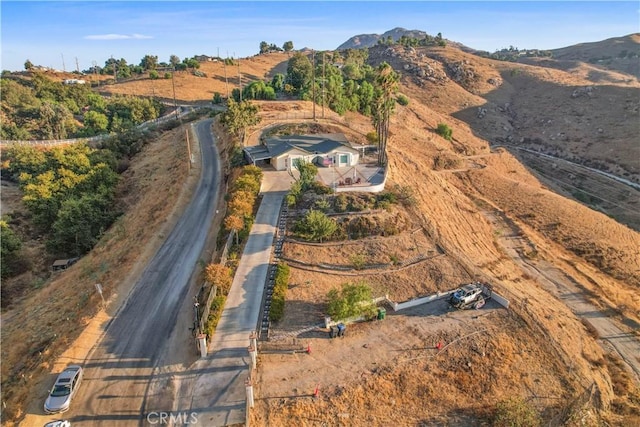8555 Pigeon Pass Rd, Moreno Valley, CA 92557 - aerial view of property's location with a mountainous background