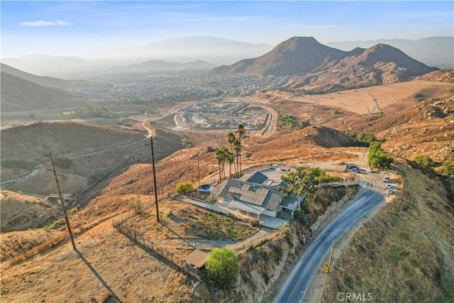 8555 Pigeon Pass Rd, Moreno Valley, CA 92557 - aerial view of property's location featuring a mountainous background