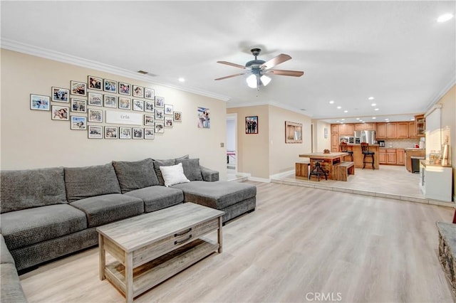 8555 Pigeon Pass Rd, Moreno Valley, CA 92557 - living area featuring recessed lighting, ceiling fan, crown molding, and light wood-style floors