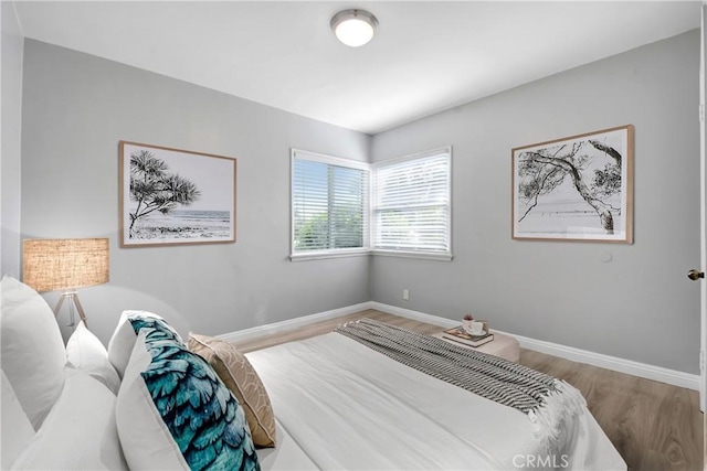 1510 E Idahome St, West Covina, CA 91791 - bedroom featuring wood finished floors and baseboards